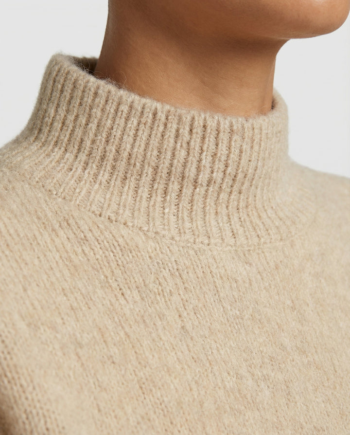 Soft Cashmere Roll Neck Sweater